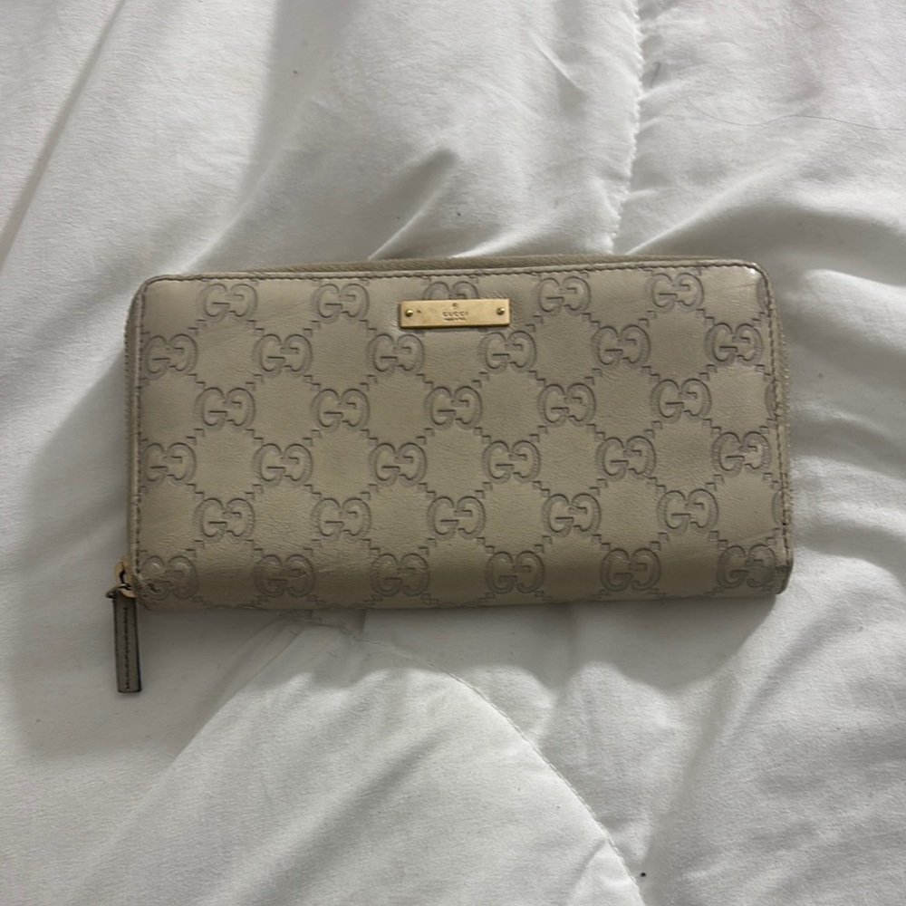 Gucci Cream Wallet with Iconic Monogram and Gold Accents